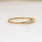Slender Seven Diamond Band in Yellow Gold