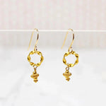 Twisted O Earrings with 22k Embellishment by brunet