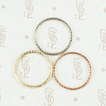 The diamond wheat band by 720 in yellow, white and rose gold in top view.
