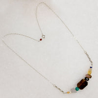 Energetic Gemstone Arc on Silver Necklace by Brin
