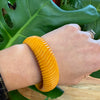 Chunky Orange Bakelite Bangle Carved with Wavy Design