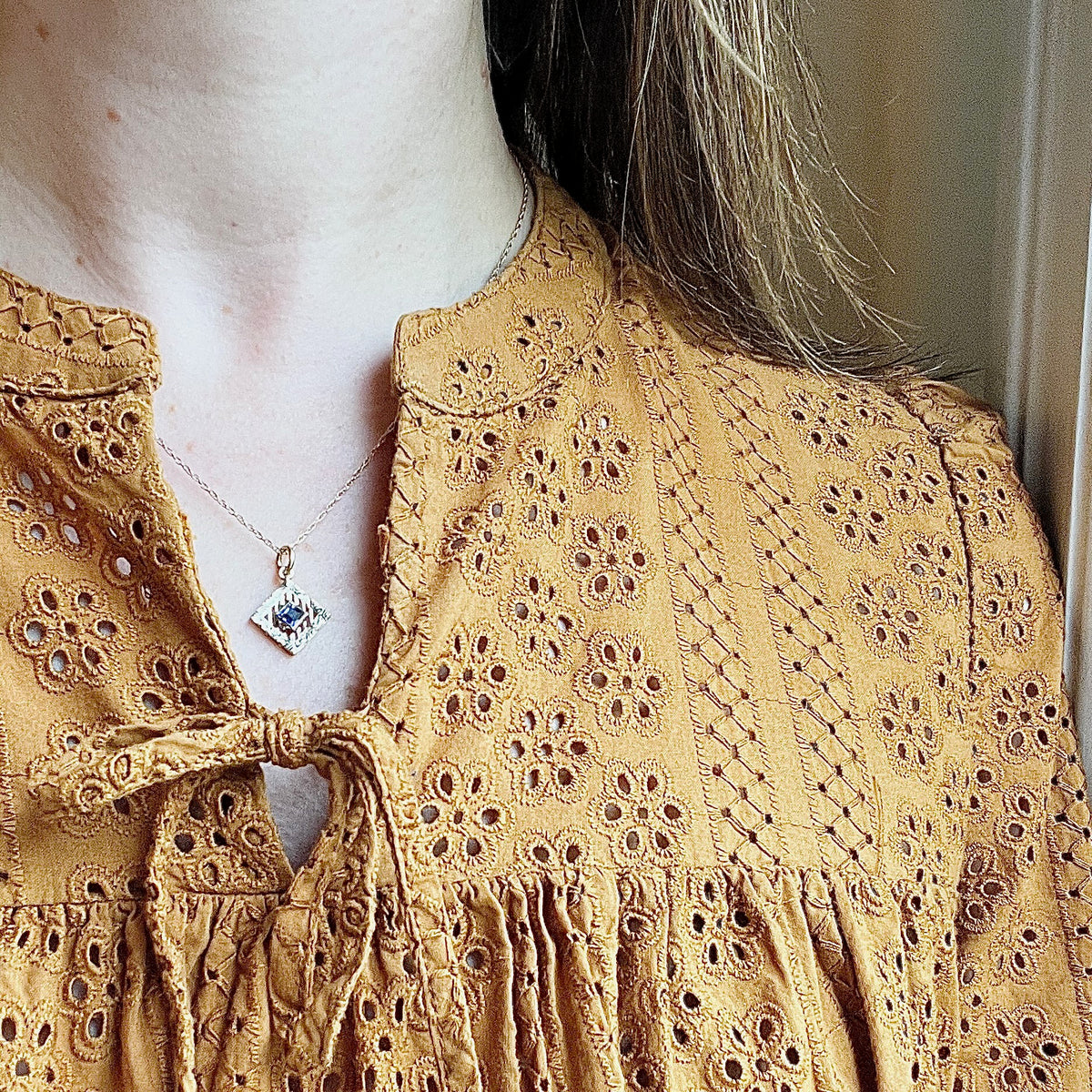 Filigreed & Engraved Gold Pendant with Sapphire