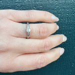 Refined Mid-Century Emerald Cut Diamond Engagement Ring