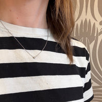 Cheeky Little .10ct Diamond in Platinum Bezel Pendant