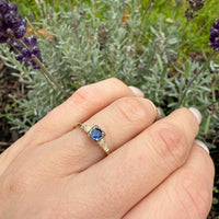Graceful Sapphire Engagement Ring with Engraved Flowers