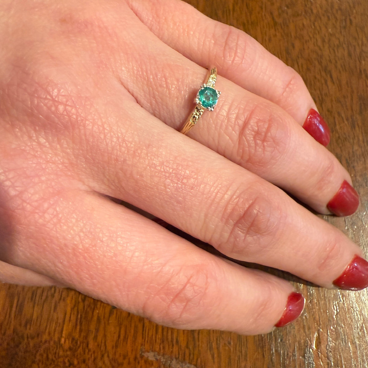 Lovely Emerald in Engraved Solitaire Ring