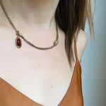 Sly Serpent Pendant with Sugar Loaf Garnet