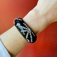 Black Celluloid Clamper Bracelet with Sparkling Fireworks