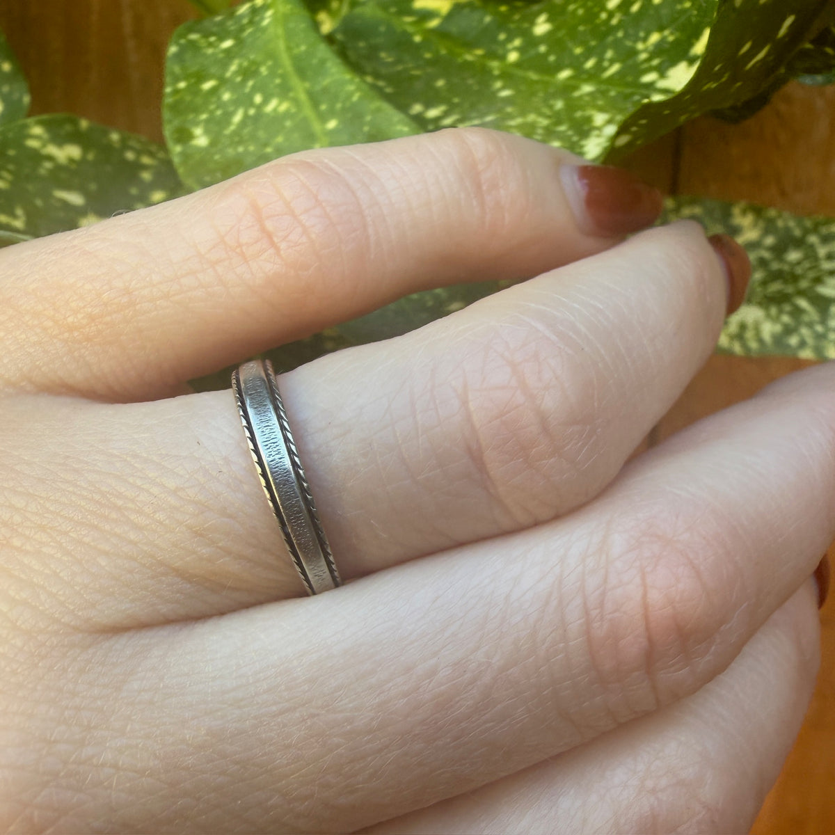 Unusual Tapered White Gold Band with a Twist