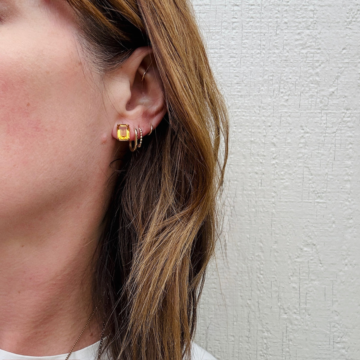 Golden Emerald Cut Citrine in Gold Stud Earrings