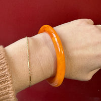 Marmalade-Colored Plastic Bangle Bracelet