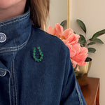 Edwardian Green Glass Horseshoe Brooch