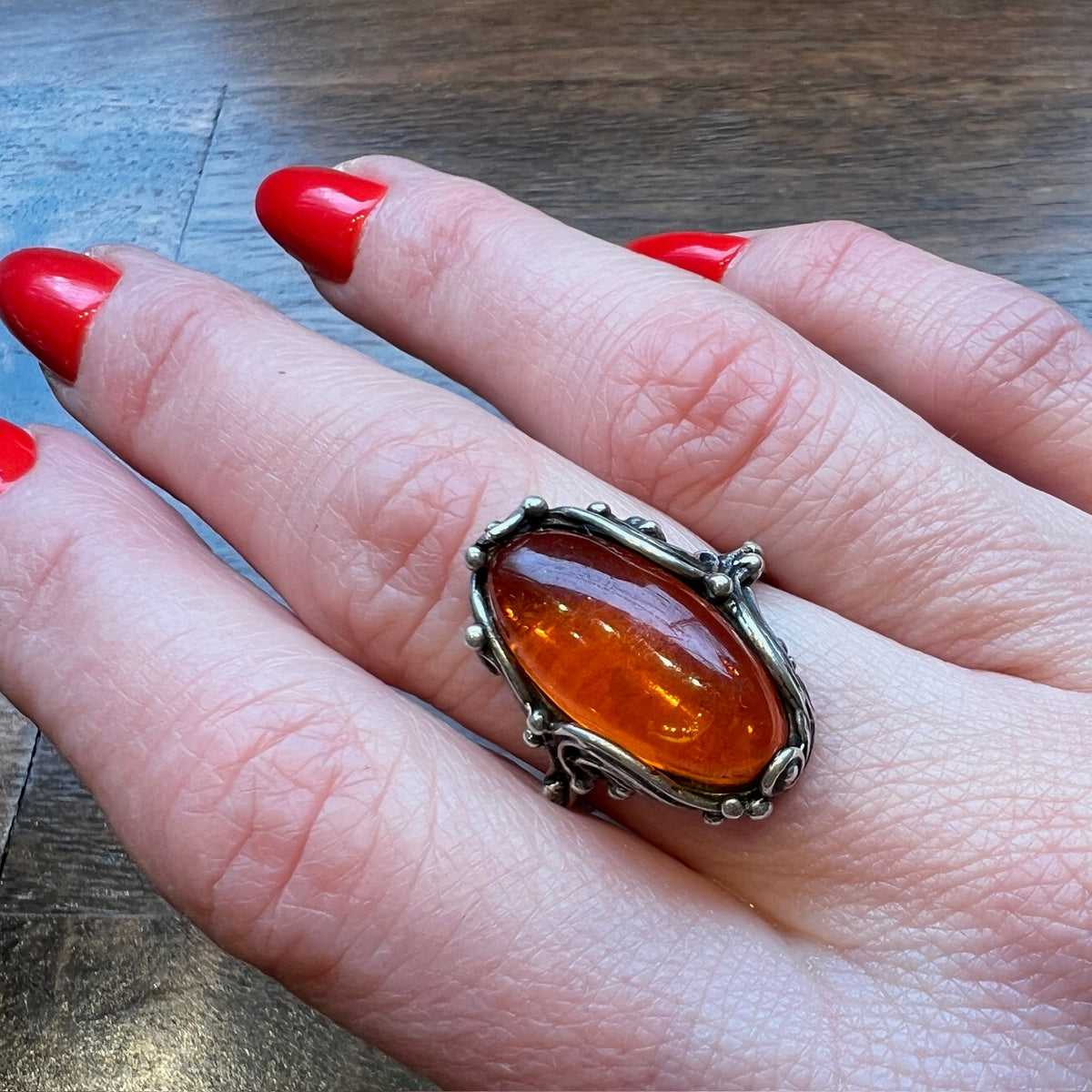 Golden Amber in Undulating Silver Ring