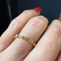 Sculpted 14k Gold Band with Five Bright Diamonds