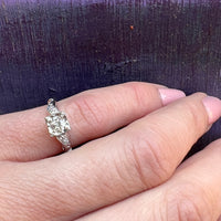 Classic Diamond & White Gold Ring with Jaunty Wave