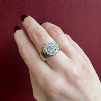 Dazzling Diamond Cluster on Curvaceous Gold Band