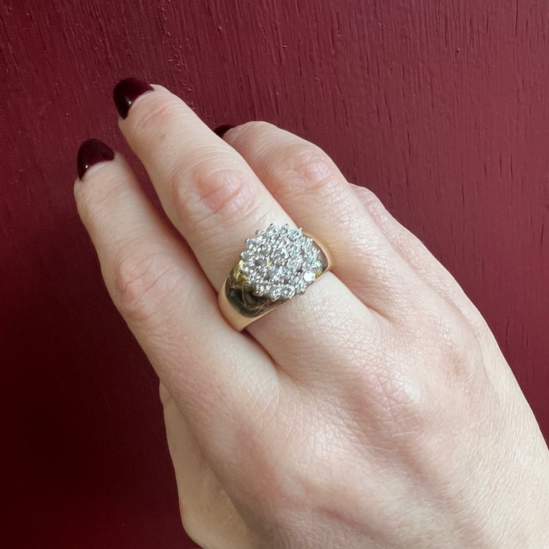 Dazzling Diamond Cluster on Curvaceous Gold Band