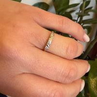 Five Pretty Diamonds in Two-Tone Gold Wedding Band