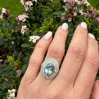 Heavenly Aquamarine & Diamond Swirling Halo Ring