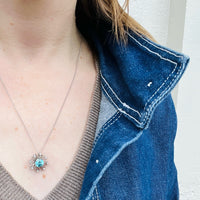 Natural Blue Zircon in Diamond-Set White Gold Pendant