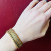 Striking Gold Filled Etruscan Revival Hinged Bangle