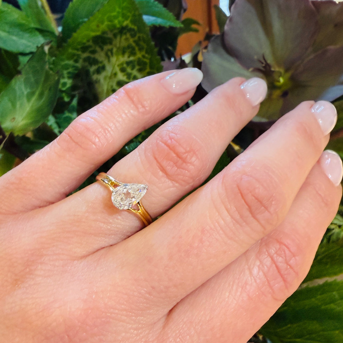 Bright White & Sparkling Pear Cut Diamond Solitaire Ring