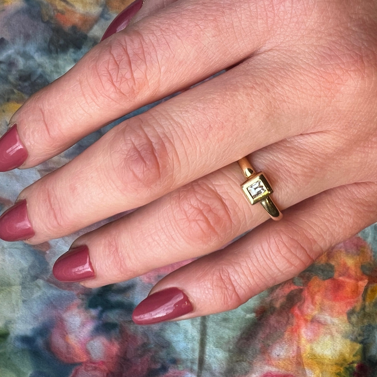 Emerald Cut Diamond in 18k Gold Bezel Solitaire Ring