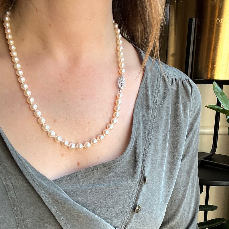 Matinee Length Pearl Necklace with Decorative Diamond Clasp