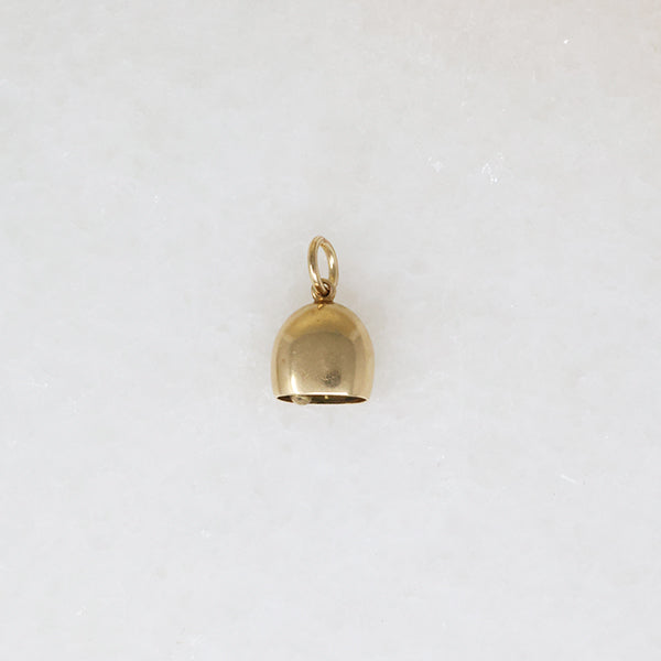 A Glimmering Gold Bell Lucky Charm