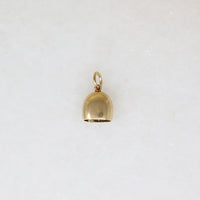 A Glimmering Gold Bell Lucky Charm