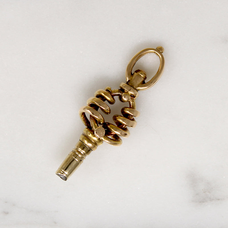 Fascinating Form 14k Gold Watch Key