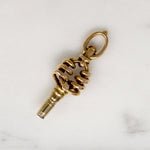 Fascinating Form 14k Gold Watch Key