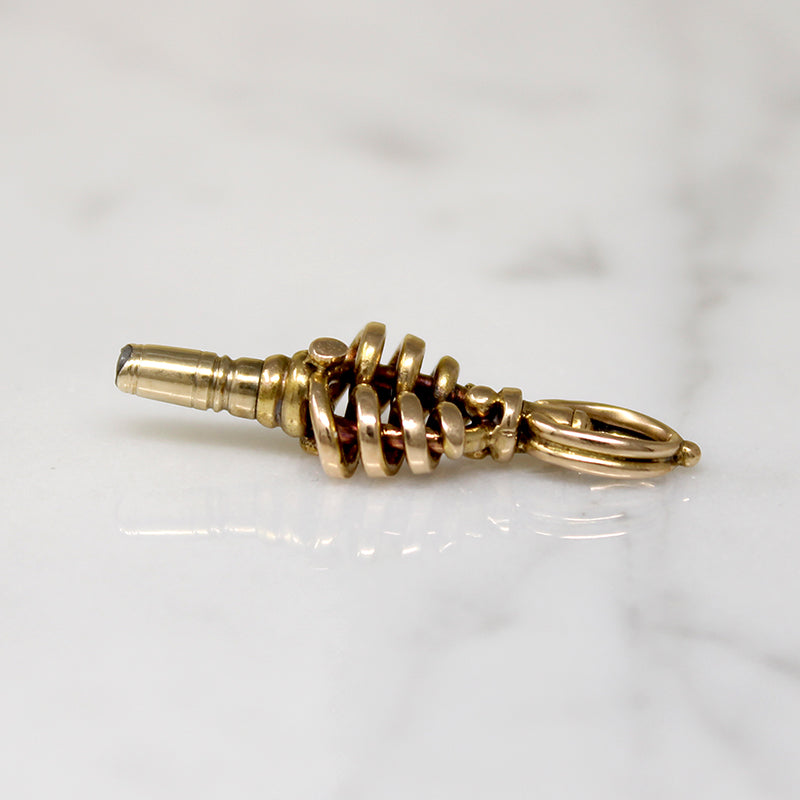 Fascinating Form 14k Gold Watch Key