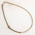 A segment of fancy Victorian foxtail punctuates a gorgeous flattened curb in this superb 14k gold married chain necklace. One end of the vintage curb chain ends with a watch hook. The other ends in a short segment of double foxtail chain with domed terminals displaying a t-bar and watch hook drop. This fabulous necklace fastens in the front; the double watch hooks will display your favorite bits &amp; bobs to perfection. Ingredients circa 1860 to 1940.  From the Married Chains Collection by Ancient Influenc