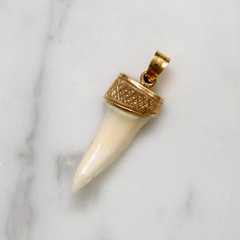 Gold Capped Tooth Charm from Ancient Influences