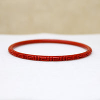 Slender Scarlet Cinnabar Bangle with Carved Meander 