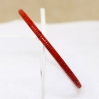 Slender Scarlet Cinnabar Bangle with Carved Meander 
