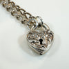 Repoussé Flower Heart Lock Bracelet by Walter Lampl