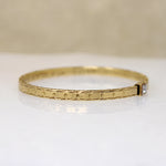 Engraved Gold Bangle Bracelet with Single Diamond