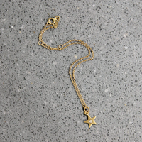 Delicate Gold Bracelet with Diamond-Set Star Charm