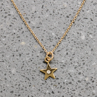 Delicate Gold Bracelet with Diamond-Set Star Charm