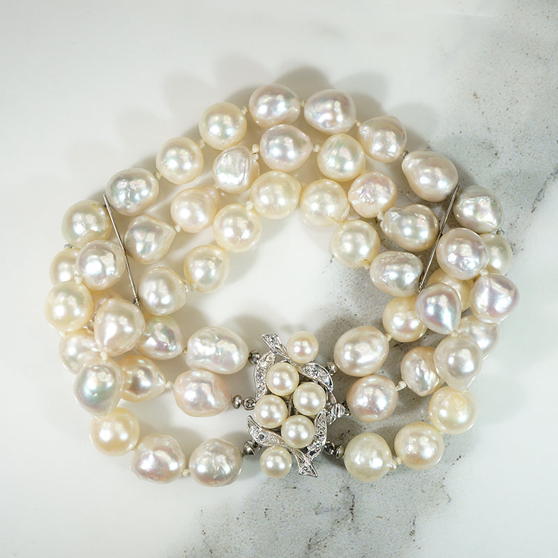 Glamorous Three-Strand Pearl Bracelet with Pearl & Diamond Clasp