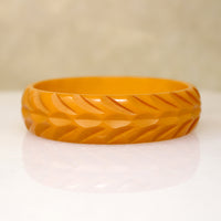Late Deco Carved Orange Bakelite Bangle Bracelet