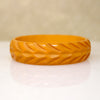 Late Deco Carved Orange Bakelite Bangle Bracelet