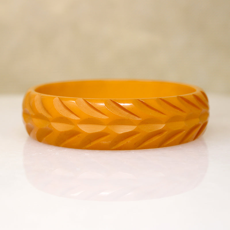 Late Deco Carved Orange Bakelite Bangle Bracelet