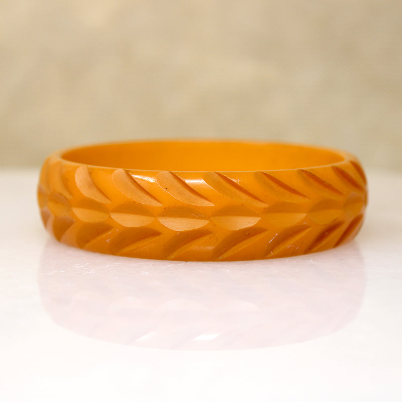Late Deco Carved Orange Bakelite Bangle Bracelet