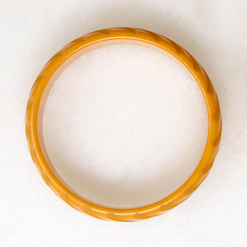 Late Deco Carved Orange Bakelite Bangle Bracelet