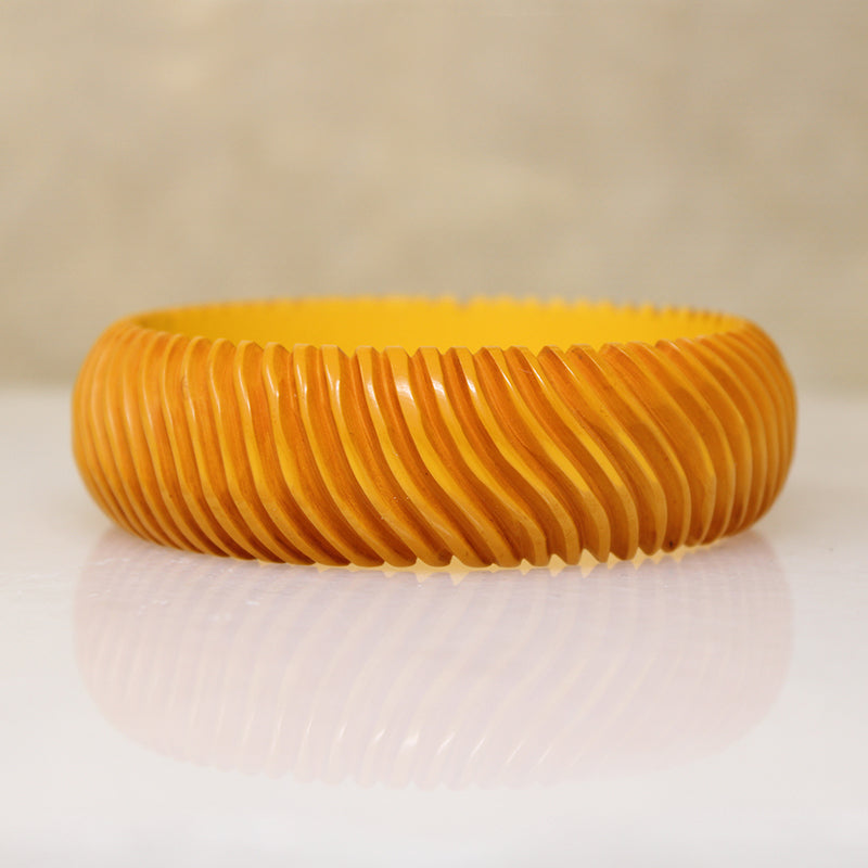 Chunky Orange Bakelite Bangle Carved with Wavy Design