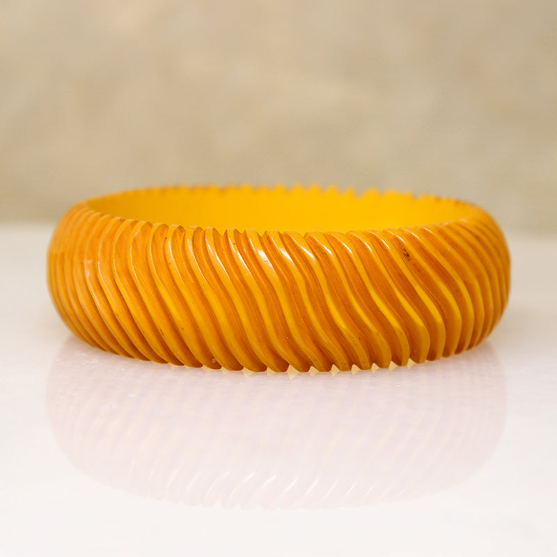 Chunky Orange Bakelite Bangle Carved with Wavy Design