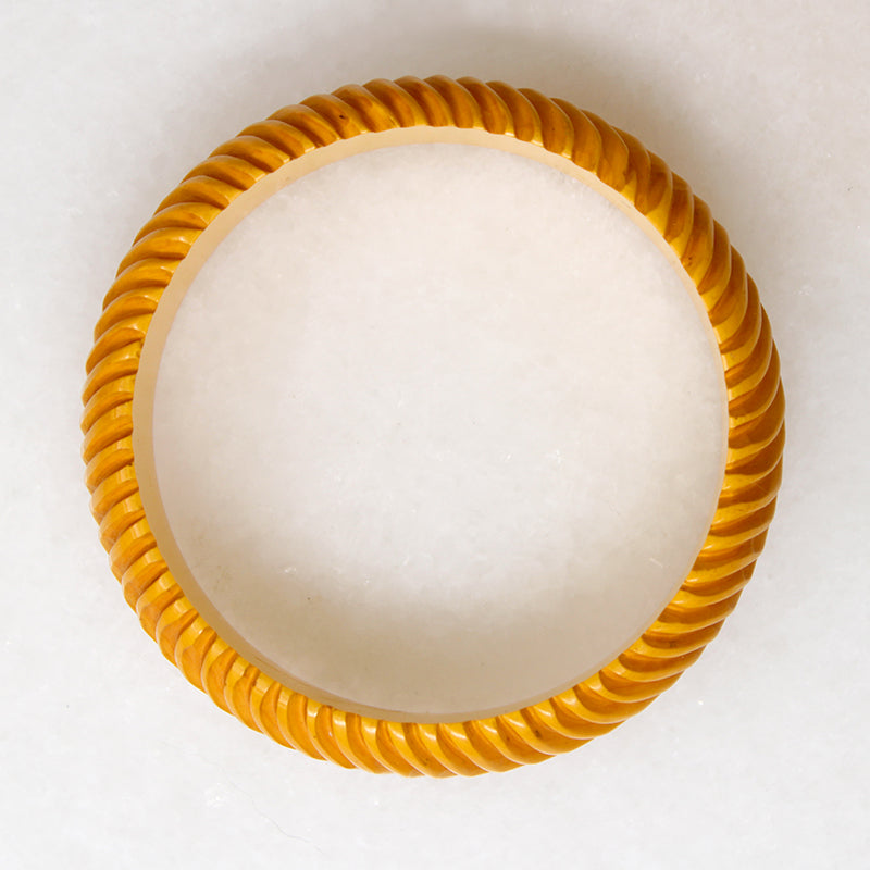 Chunky Orange Bakelite Bangle Carved with Wavy Design